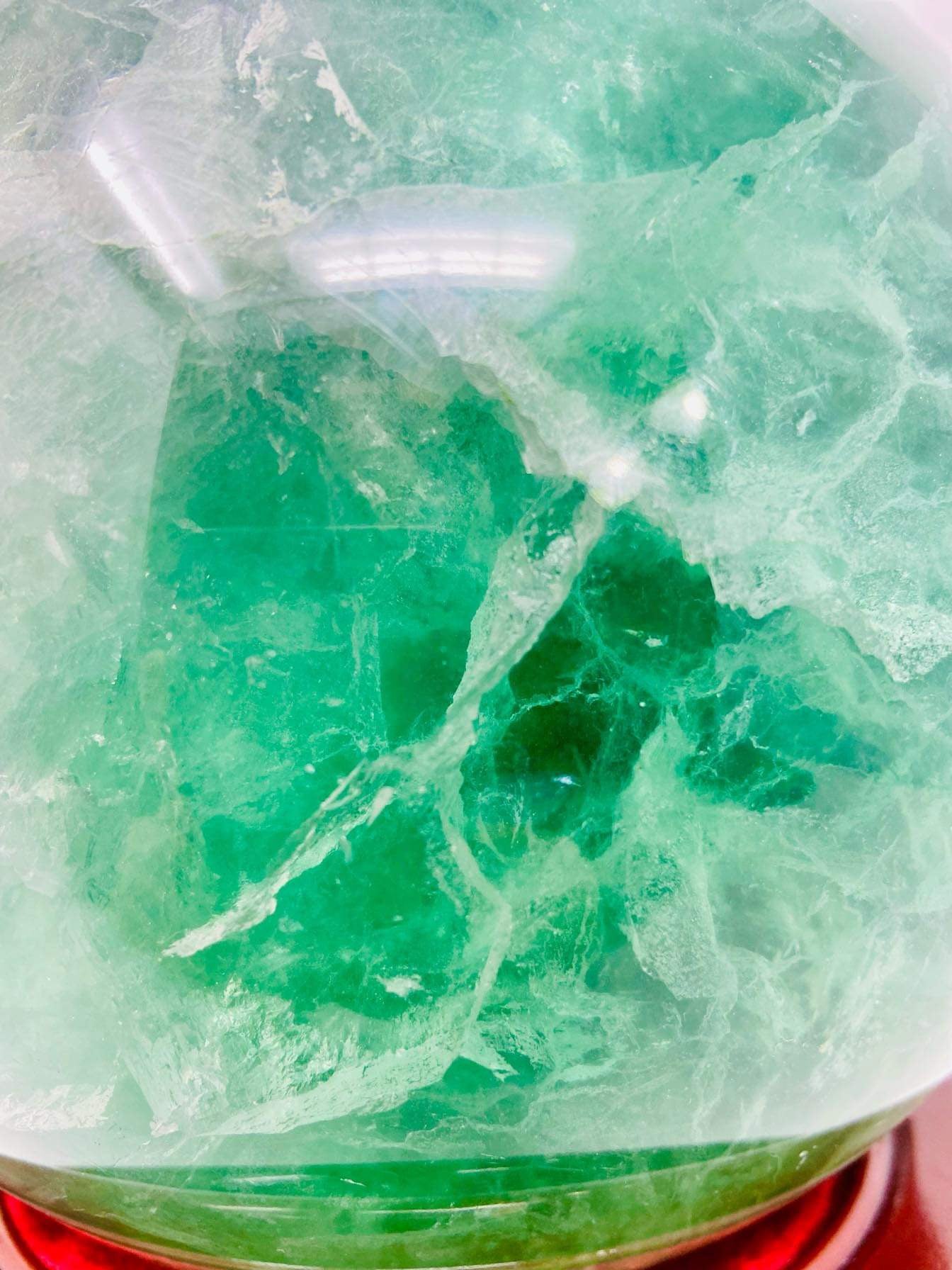 Fluorite Sphere with Golden Healer and Garden Quartz inclusions